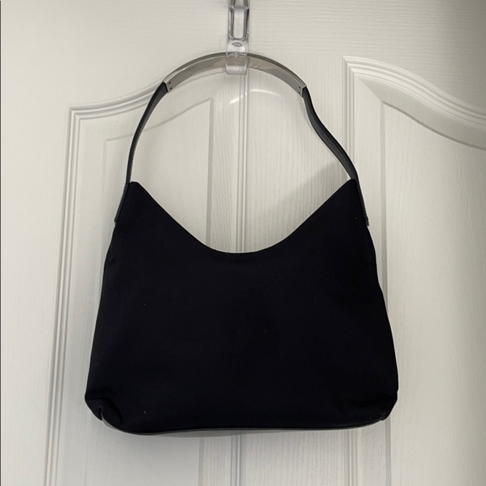 Gucci purse with metal handle